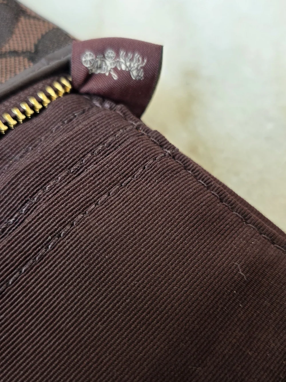 COACH Dempsey Large Corner Zip Wristlet Signature Jacquard Stripe